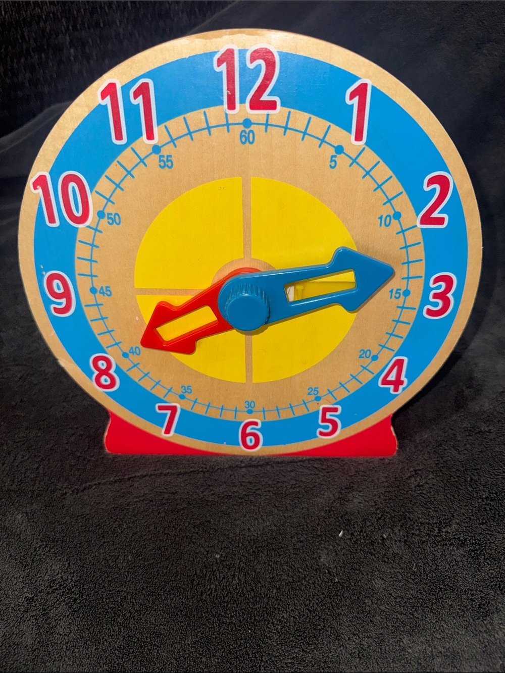 Melissa & Doug Wooden Teaching Clock - Blue, Red & Yellow. For kids to tell time